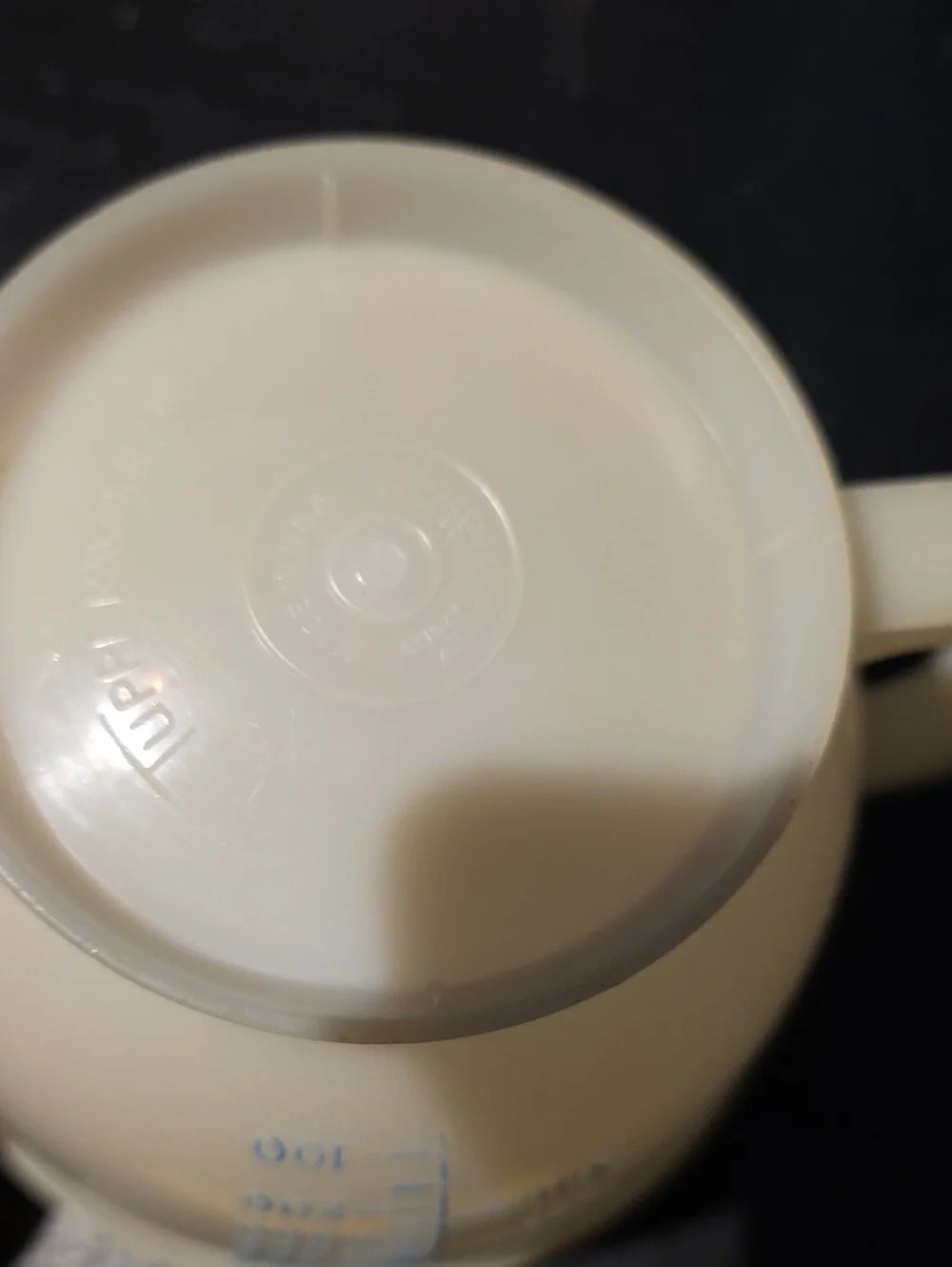 Plastic Measuring Cup with Blue Markings